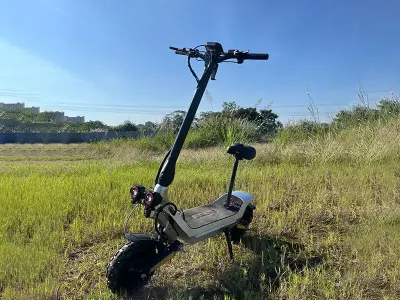 Foldable Dual-Motor Commuter E-Scooter: 2400W Peak, 80km Range, App Unlock, Aluminum Frame — Media 1