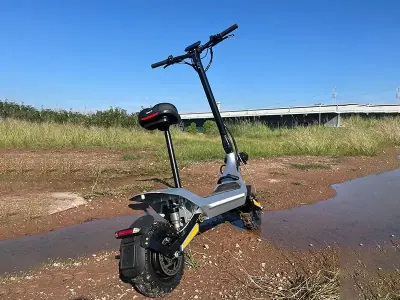 Foldable Dual-Motor Commuter E-Scooter: 2400W Peak, 80km Range, App Unlock, Aluminum Frame — Media 3